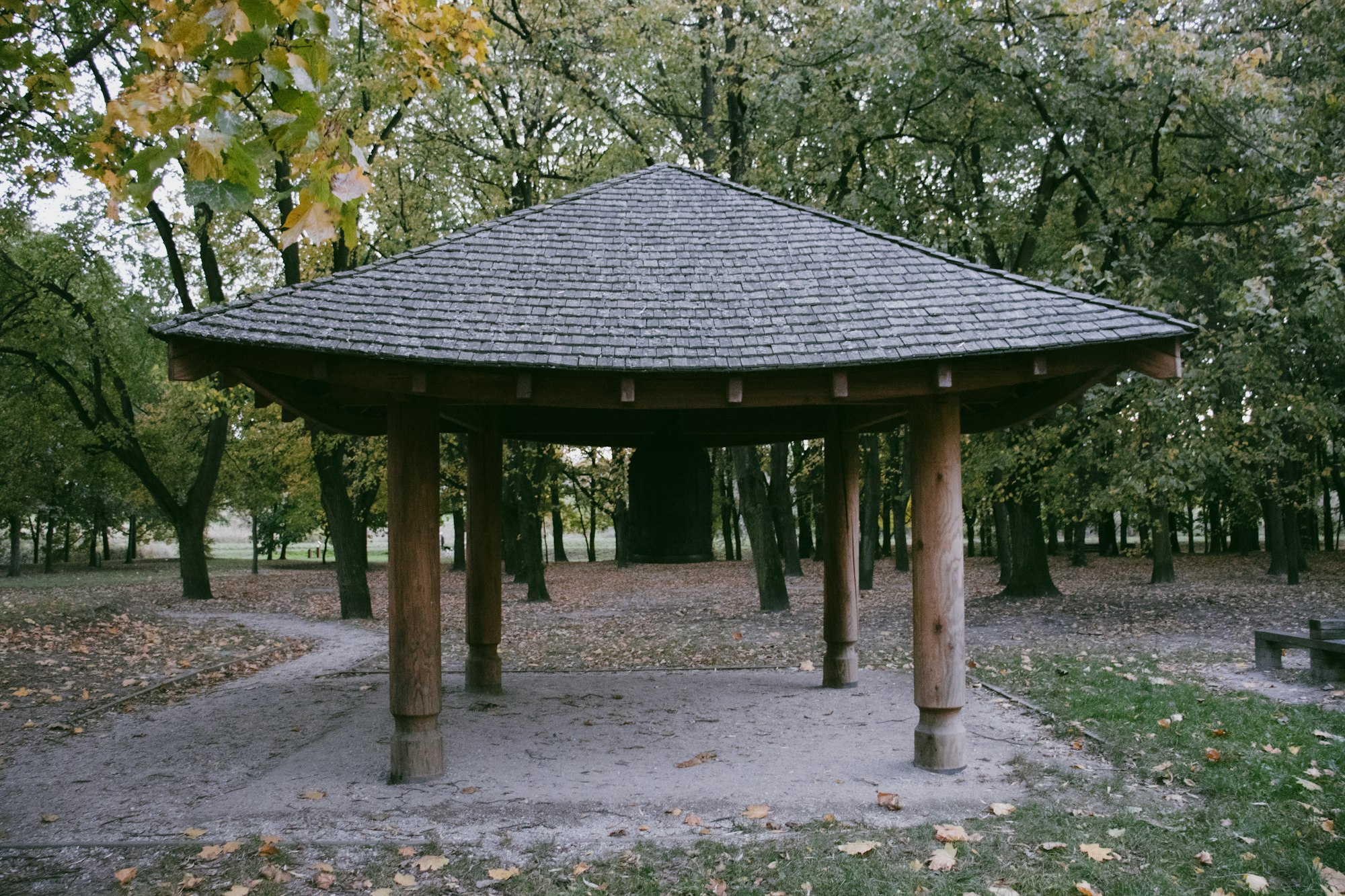 A covered gazebo surrounded by trees, representing the Heritage Park expansion project.